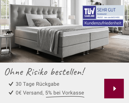 Bett in Grau